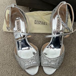 badgley Mischka silver wedges.